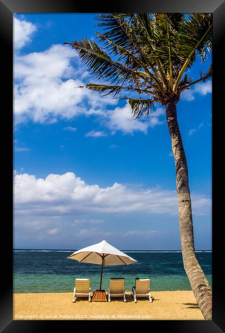 Beach umbrella and chairs, Sanur Beach Framed Print by Kevin Hellon