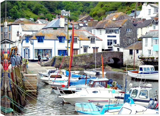 Harbour and town, Polperro, Cornwall. Canvas Print by john hill