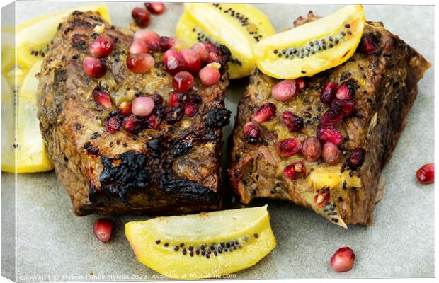 Beef meat baked with kiwi and pomegranate. Canvas Print by Mykola Lunov Mykola