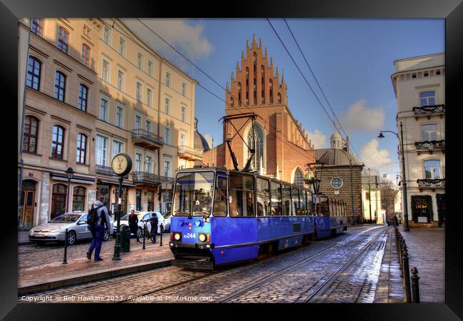 Krakow tram and church  Framed Print by Rob Hawkins