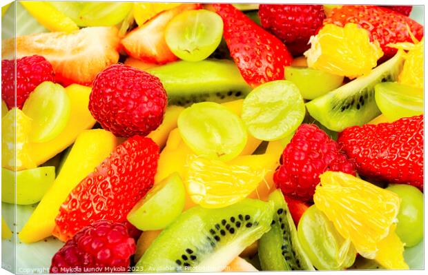 Fruit salad of citrus and berries. Canvas Print by Mykola Lunov Mykola