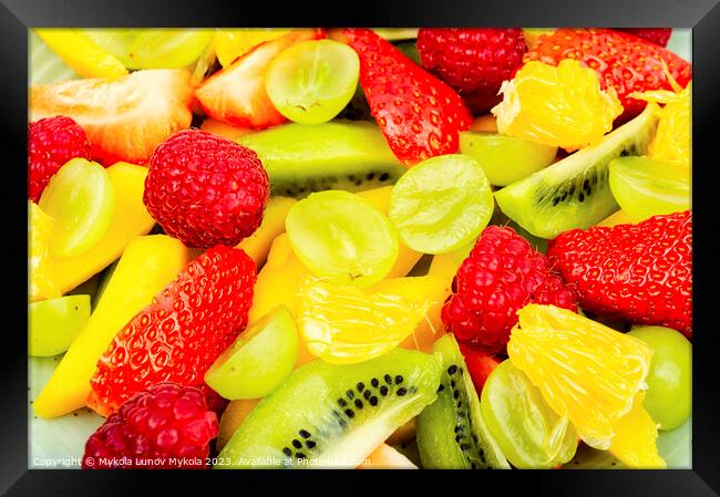 Fruit salad of citrus and berries. Framed Print by Mykola Lunov Mykola