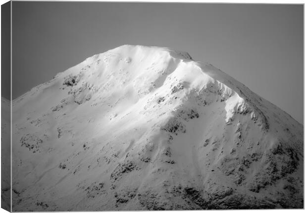 Snow covered peaks of Glencoe Canvas Print by Anthony McGeever