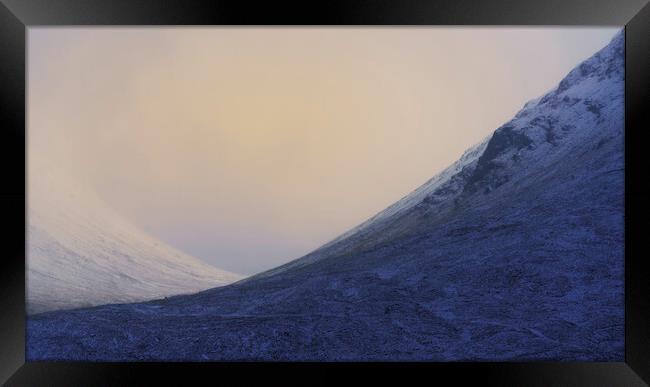 A backlit Mountain Valley Framed Print by Anthony McGeever