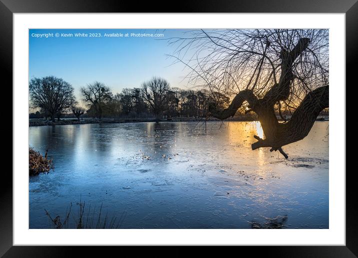 jewells of morning ice on pond Framed Mounted Print by Kevin White