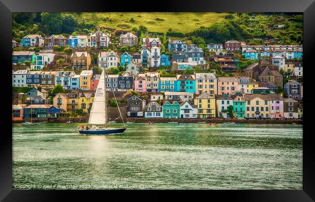 Serene Sailing Amidst Colourful Riverside Houses Framed Print by Paul F Prestidge