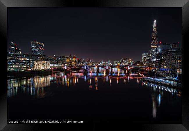 Along the Thames at Night... Framed Print by Will Elliott