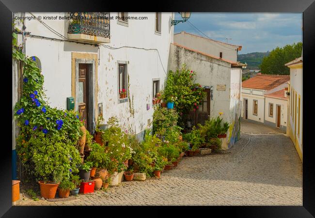 Colorful historical cobblestoned street in Aljezur, Portugal Framed Print by Kristof Bellens