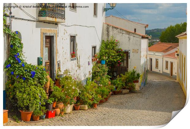 Colorful historical cobblestoned street in Aljezur, Portugal Print by Kristof Bellens