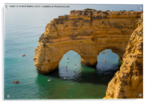 Kayaks and sup boards peddling under the Arco Natural on the Algarve coast in Portugal. Acrylic by Kristof Bellens