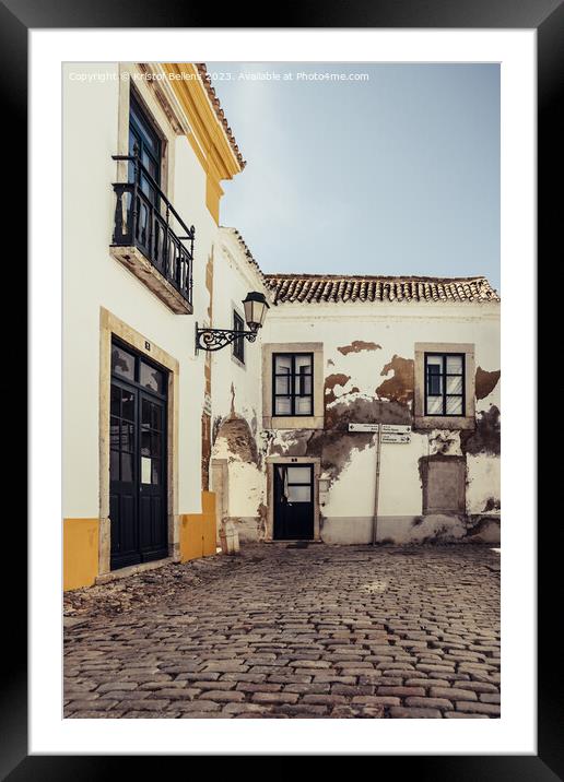 View on one of the cozy cobblestoned alleys of the old town Faro in Portugal Framed Mounted Print by Kristof Bellens