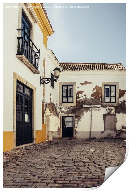 View on one of the cozy cobblestoned alleys of the old town Faro in Portugal Print by Kristof Bellens