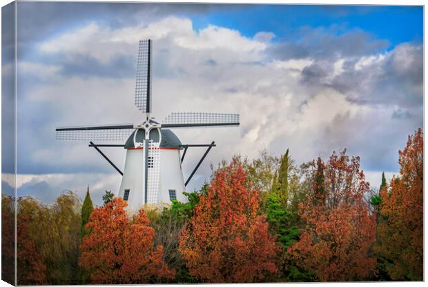 White Windmill with Colorful Autumn trees Canvas Print by Maggie Bajada