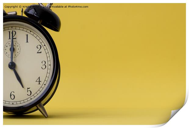 Analog alarm clock displaying five o'clock on a yellow background with copy space Print by Kristof Bellens