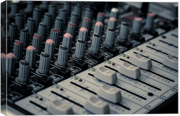 Closeup and detail of audio mixing console with faders and knobs Canvas Print by Kristof Bellens
