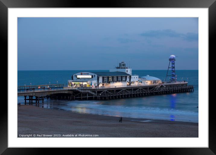 Bournemouth Pier at night Framed Mounted Print by Paul Brewer