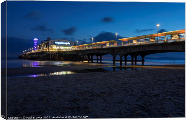 Bournemouth Pier at night Canvas Print by Paul Brewer