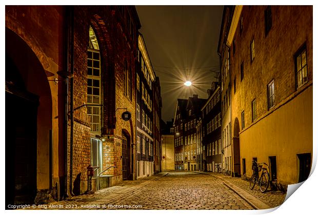 street lamp hanging over an alley at night in Copenhagen Print by Stig Alenäs