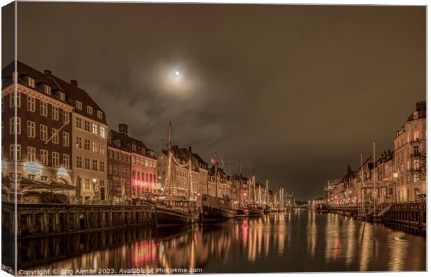 The moon is shining over the Nyhavn Canal in Copenhagen Canvas Print by Stig Alenäs