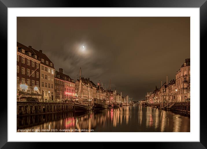 The moon is shining over the Nyhavn Canal in Copenhagen Framed Mounted Print by Stig Alenäs