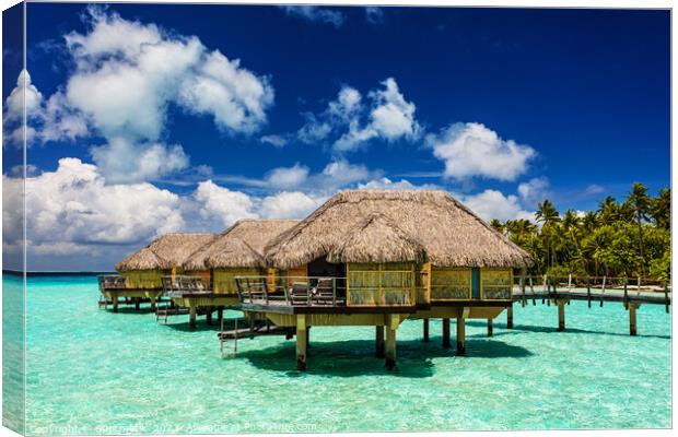 Bora Bora luxury holiday resort with Overwater Bungalows  Canvas Print by Spotmatik 