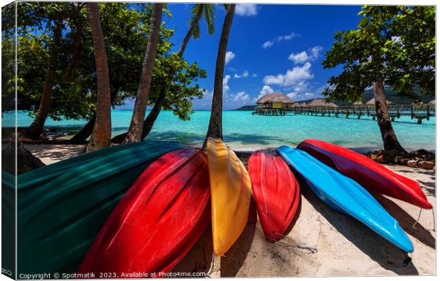 Tourist kayaks Bora Bora active vacation luxury resort  Canvas Print by Spotmatik 