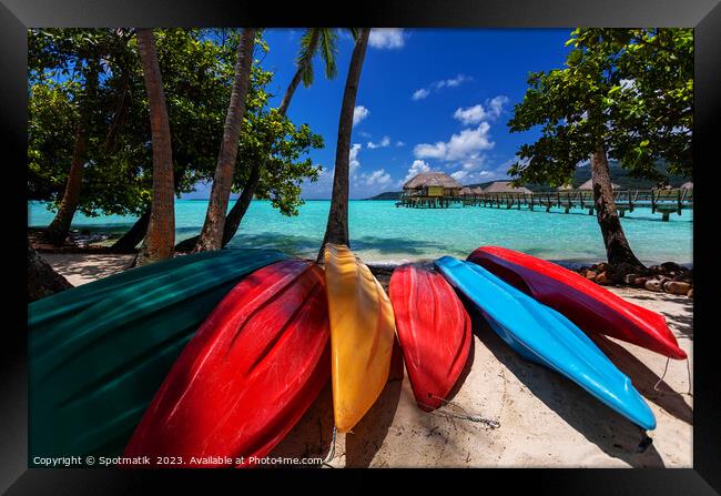 Tourist kayaks Bora Bora active vacation luxury resort  Framed Print by Spotmatik 