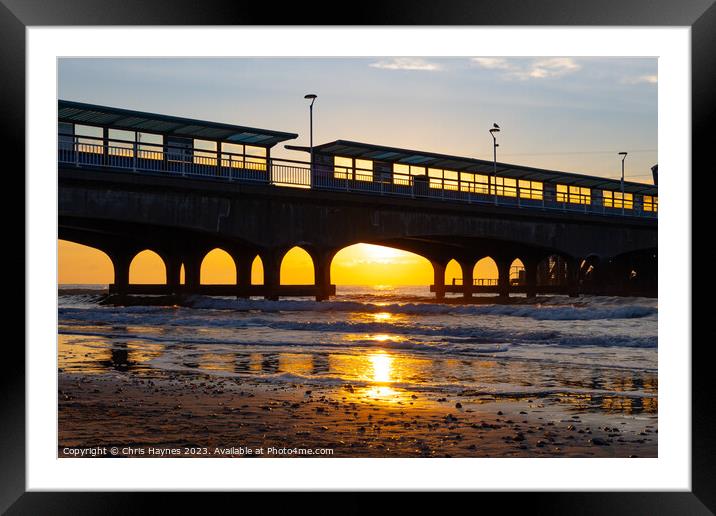 Sunrise on the sea under the arches Framed Mounted Print by Chris Haynes