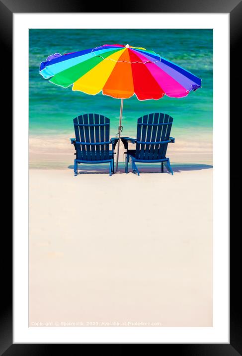 Bahamas colorful sun umbrella and two beach beds  Framed Mounted Print by Spotmatik 