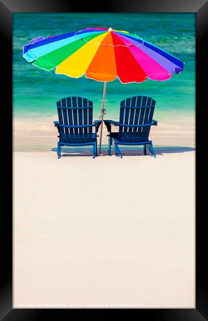 Bahamas colorful sun umbrella and two beach beds  Framed Print by Spotmatik 