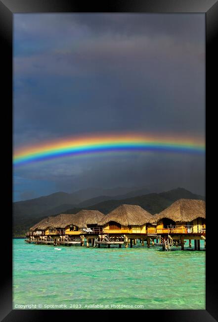 Rainbow arch over Bora Bora luxury Overwater bungalows  Framed Print by Spotmatik 