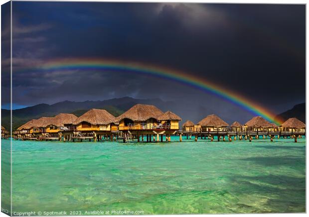 Bora Bora rainbow above Overwater Bungalows French Polynesia  Canvas Print by Spotmatik 