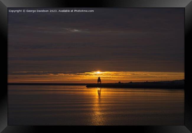 Majestic Sunrise at Herd Groyne Lighthouse Framed Print by George Davidson