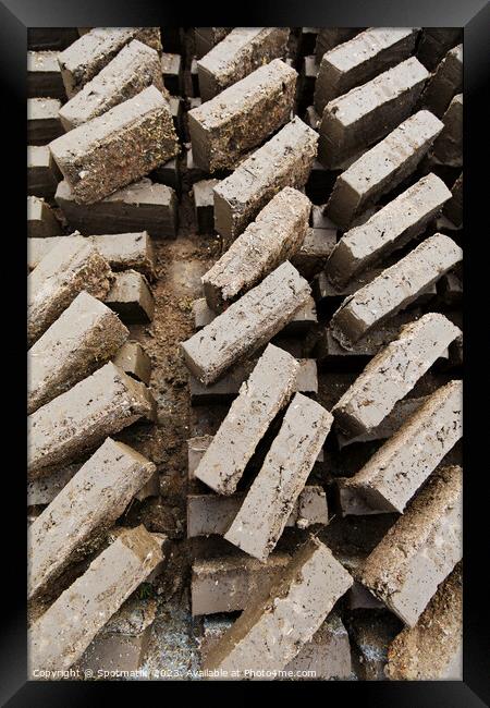 Handmade Indonesian manufactured mud and straw bricks Asia Framed Print by Spotmatik 