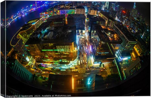 Hong Kong illuminated city traffic and skyscrapers downtown Canvas Print by Spotmatik 