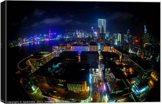 Hong Kong illuminated city traffic and skyscrapers downtown  Canvas Print by Spotmatik 