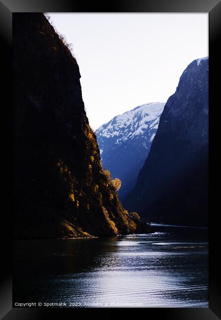 View Norwegian scenic fjord steep cliffs majestic mountains Framed Print by Spotmatik 