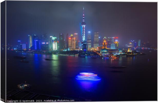 Illuminated Huangpu River Shanghai and Oriental Pe Canvas Print by Spotmatik 