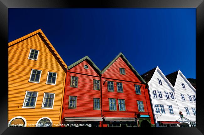 Bergen Norway a colorful wooden clad boat houses  Framed Print by Spotmatik 