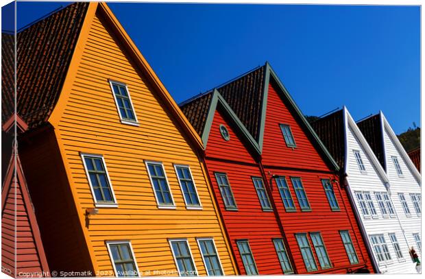 View Bryggen Bergen Old wharf traditional colorful buildings  Canvas Print by Spotmatik 