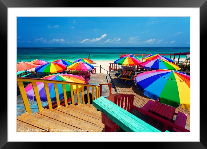 Beach umbrellas in the tropical sunshine Bahamas Caribbean Framed Mounted Print by Spotmatik 