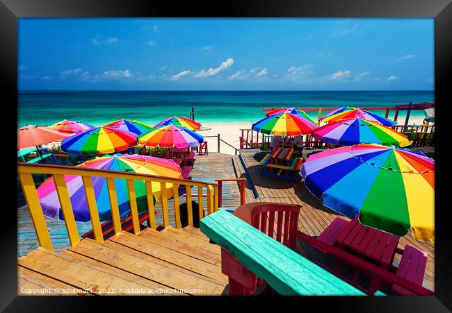Beach umbrellas in the tropical sunshine Bahamas Caribbean Framed Print by Spotmatik 