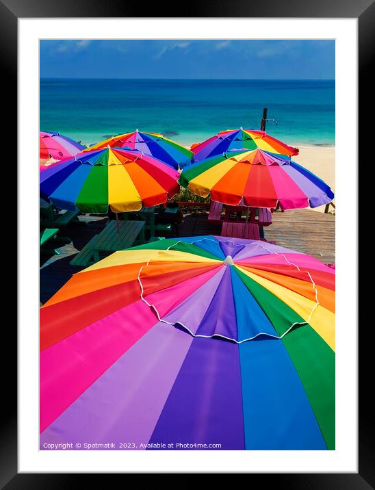 Colorful beach umbrellas in the tropical sunshine Caribbean Framed Mounted Print by Spotmatik 