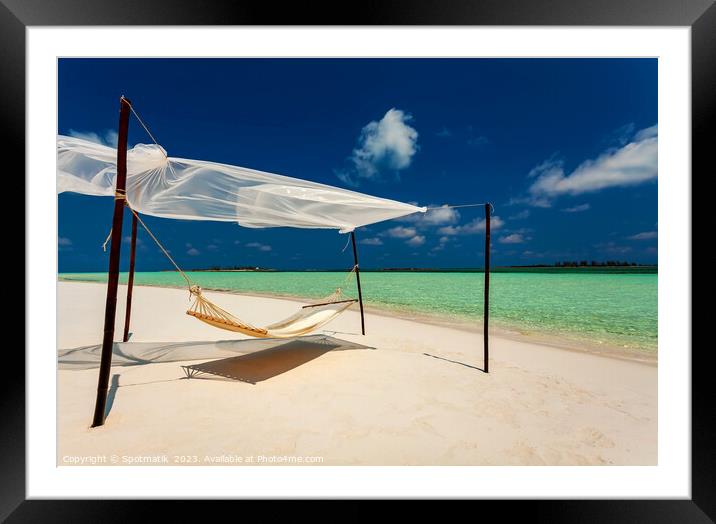 Hammock on the shoreline remote luxury paradise Island  Framed Mounted Print by Spotmatik 