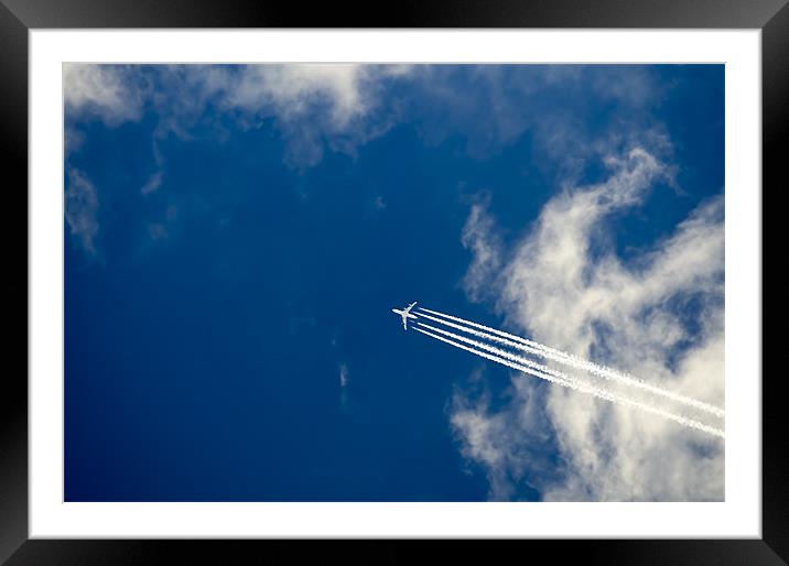 Airliner passing  overhead Framed Mounted Print by Gary Eason