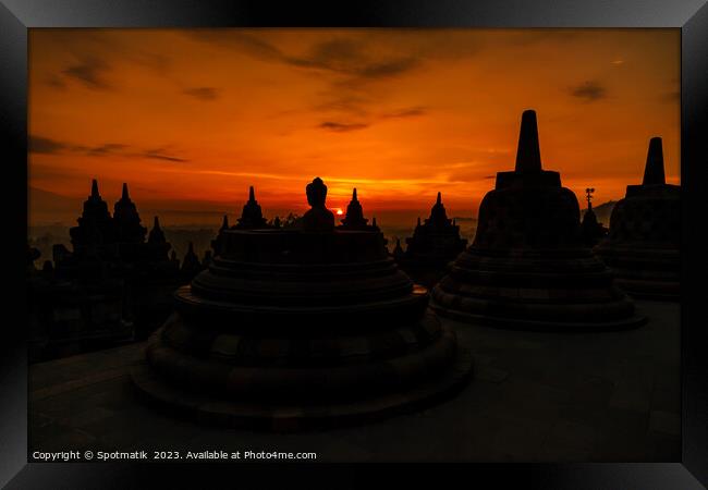 Sunrise over Borobudur a religious ruined temple Java  Framed Print by Spotmatik 