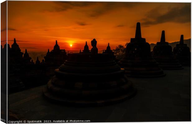 Early morning view at sunrise Borobudur religious temple  Canvas Print by Spotmatik 