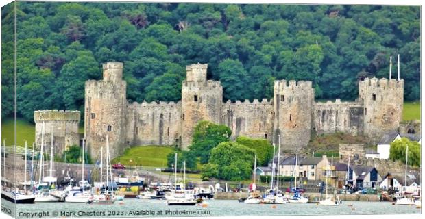 Majestic Conwy Castle and Tranquil Boats Canvas Print by Mark Chesters