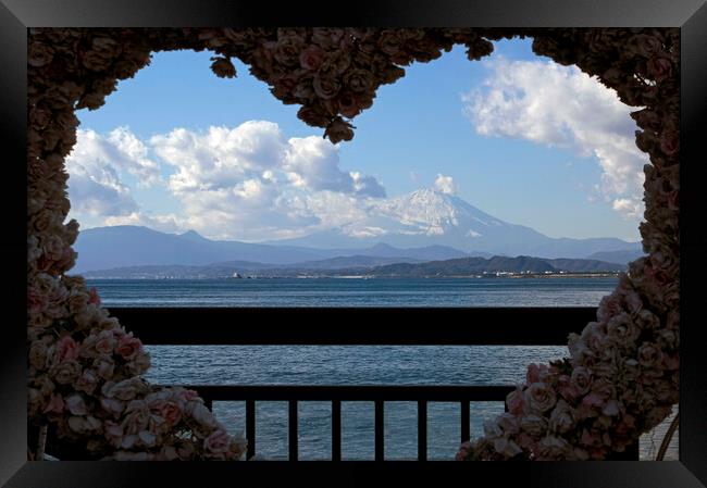 Mount Fuji seen through a heart-shaped frame with flowers Framed Print by Lensw0rld 