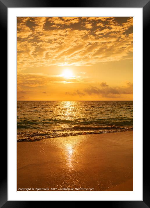 Sunset reflecting on ocean at tourist destination Bahamas Framed Mounted Print by Spotmatik 